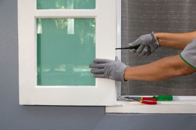 Storm Window Installation on a Home